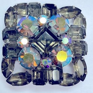 Vintage signed Judy Lee brooch. Beautiful aurora borealis crystal.